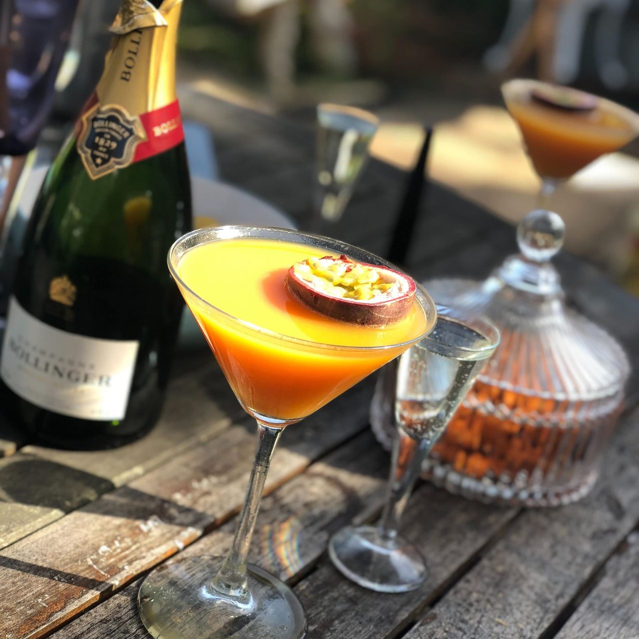 Passion fruit martinis with a bottle of Bollinger Champagne at Rosa Twelve