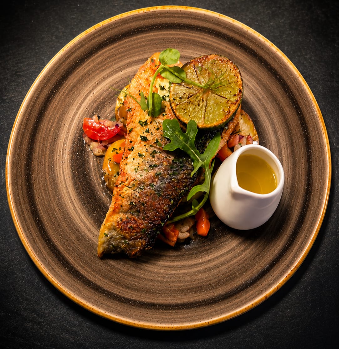 Pan-fried sea bass fillet with Mediterranean vegetables at Rosa Twelve