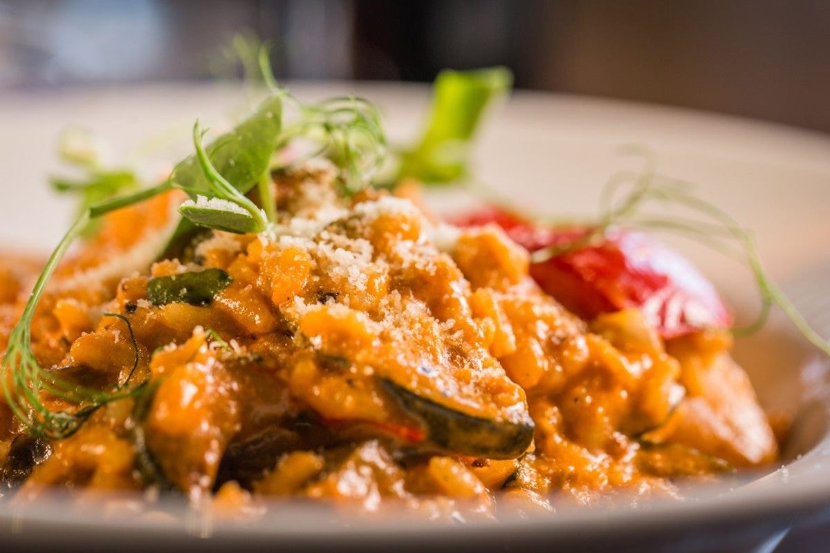 A bowl of tomato and vegetable risotto at Rosa Twelve